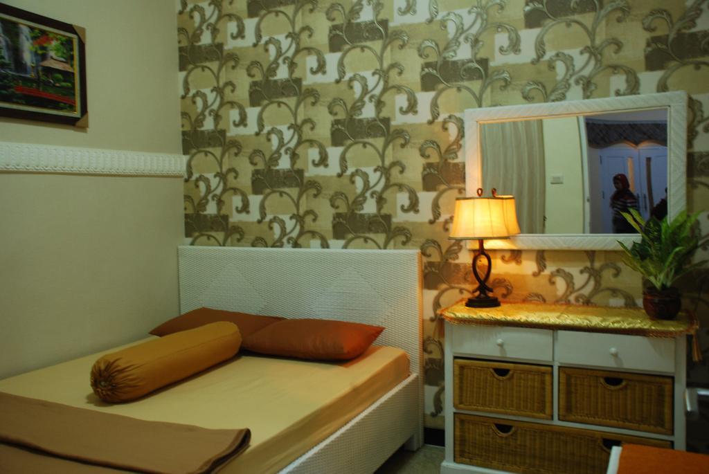 Griya Nelwan Guest House Malang Værelse billede