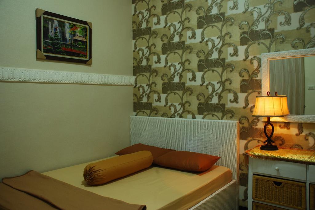 Griya Nelwan Guest House Malang Værelse billede